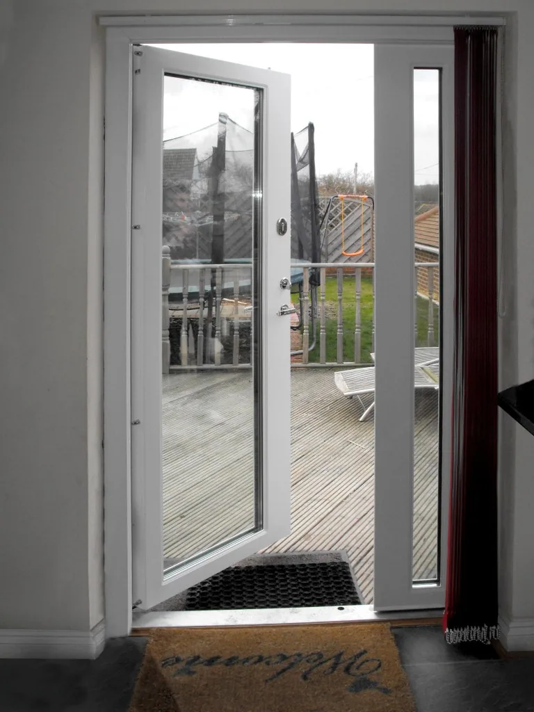 Bullet-resistant glass security door in a residential opening