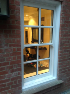 Bullet-resistant window installed in a brick wall