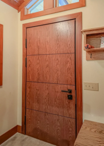 Embassy forced-entry-resistant exterior security door with oak veneer