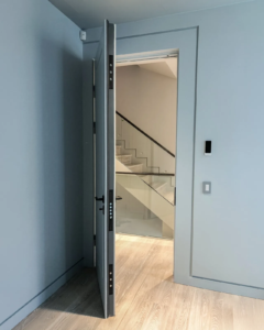 Embassy residential security door installed in a modern interior