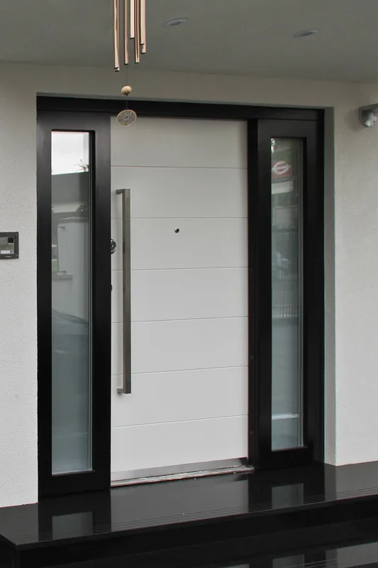 High-security entry door with bullet-resistant glass sidelights