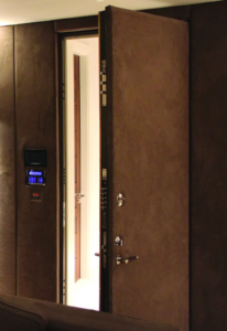 Heavy high-security door shown open to display door thickness