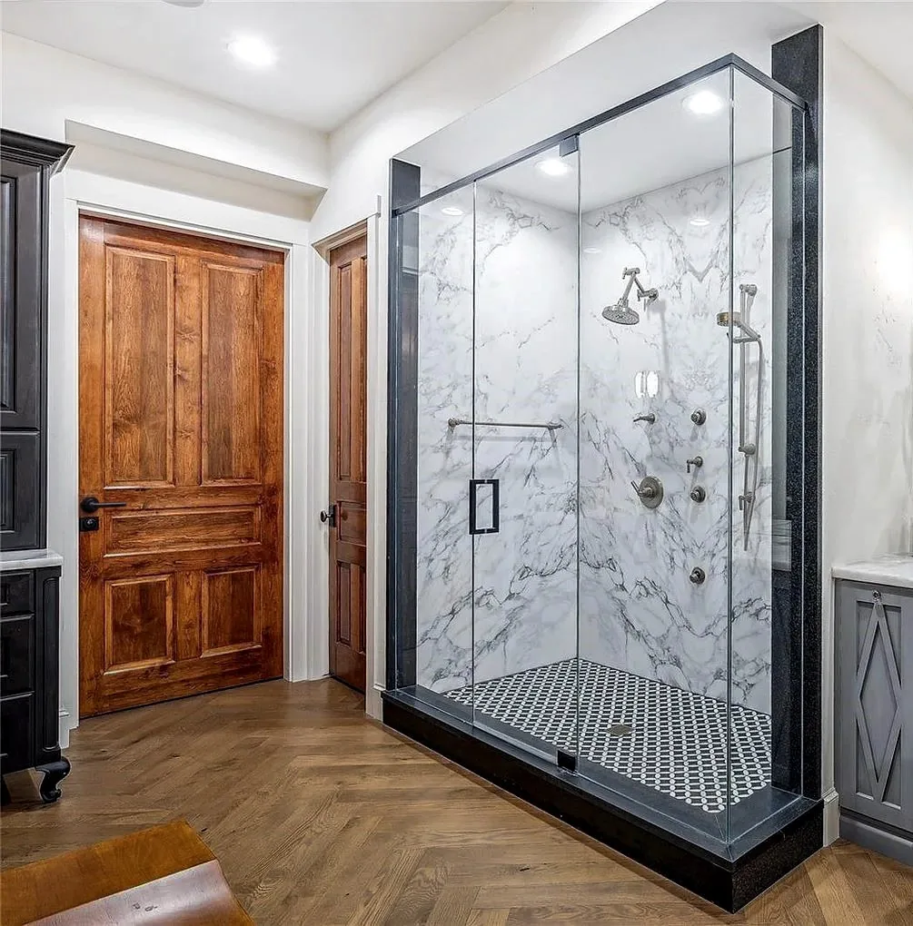 Vault room security door integrated in a bathroom