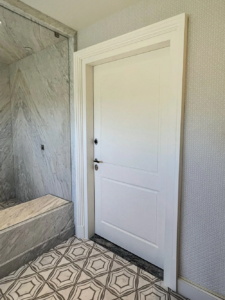 Vault room door designed to blend with the surrounding interior