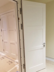 White safe room security door shown open