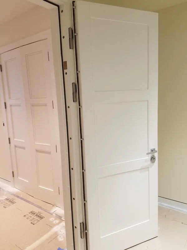 White safe room security door shown open